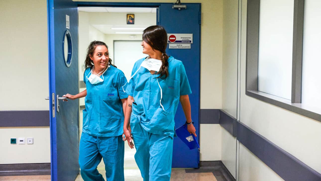 Students walking through the hospital hallway