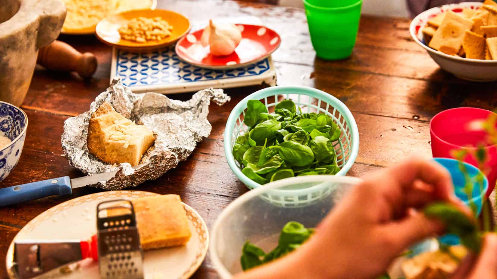 Students learning how to make pesto.