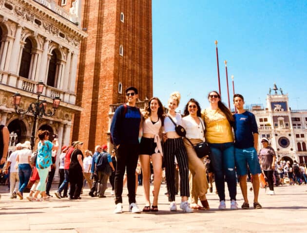 Atlantis students in a city square.