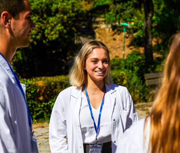 An Atlantis student smiling outside of the hospital.