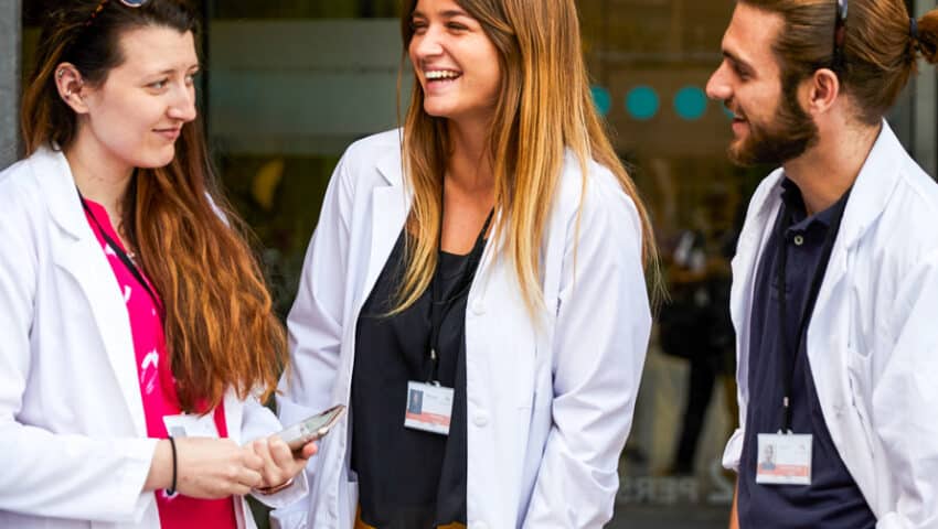 Students outside the hospital where they are shadowing.