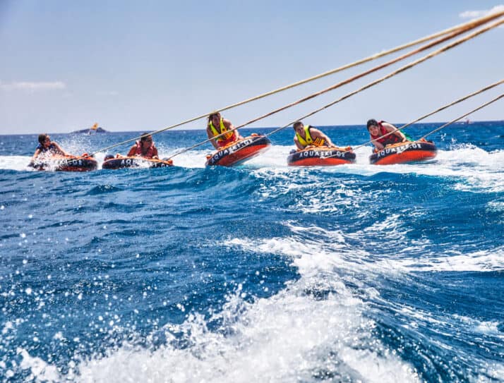 Students tubing in the ocean in Greece.