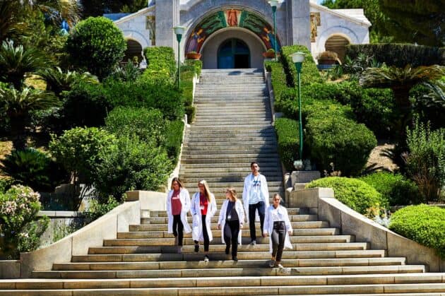 Students walking down a set of stairs.