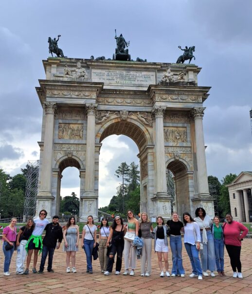 Atlantis students in front of a monument in Milan, Italy.